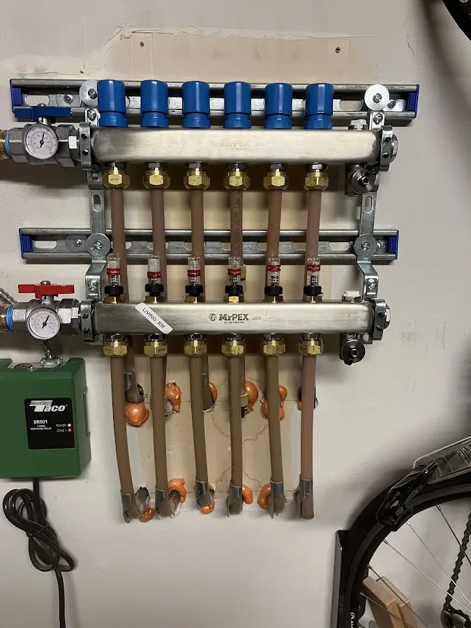 Plumber performing Gas Line Installation at a residential property in Hamtramck